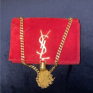 YSL clutch with gold accessories